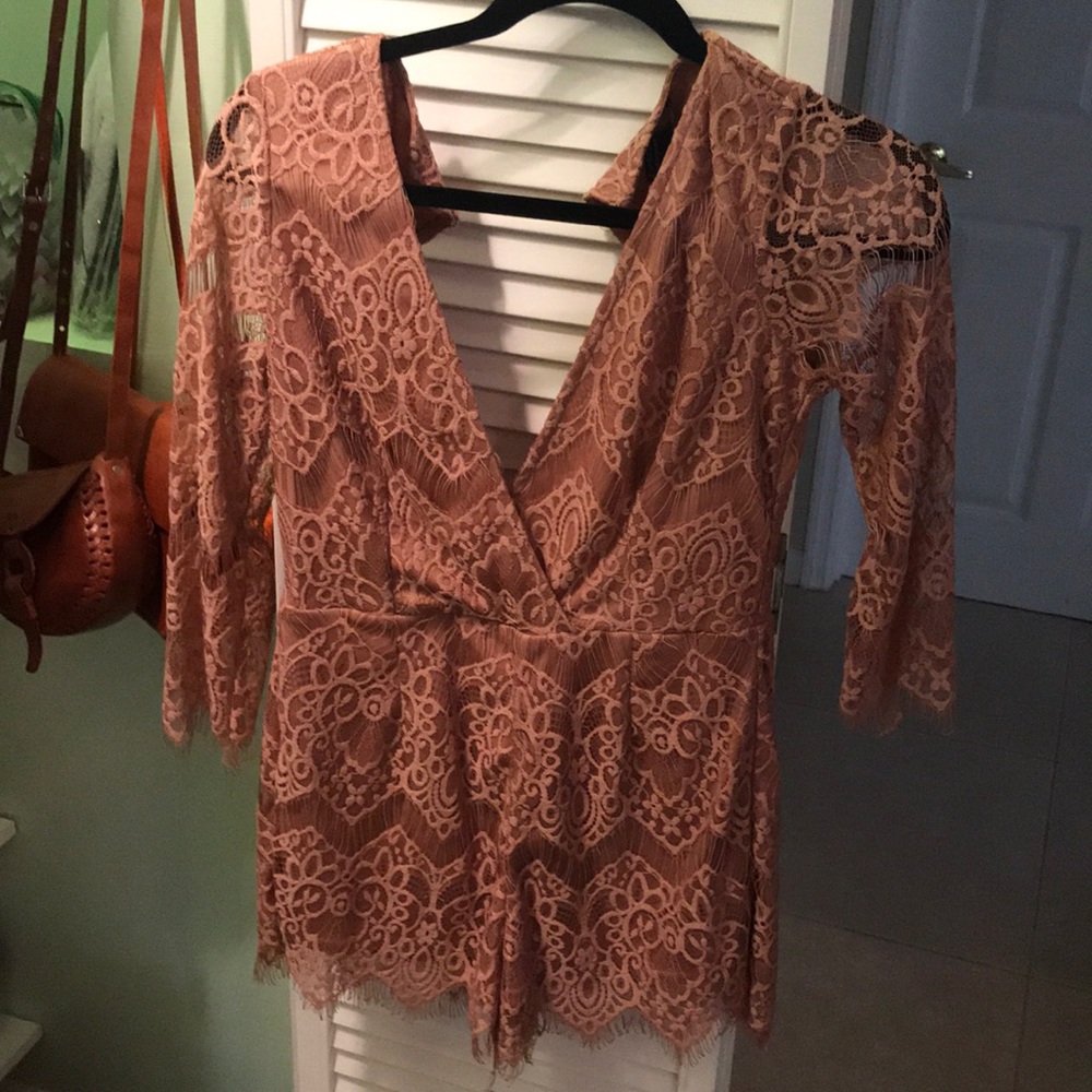 Romper. Brand new never worn